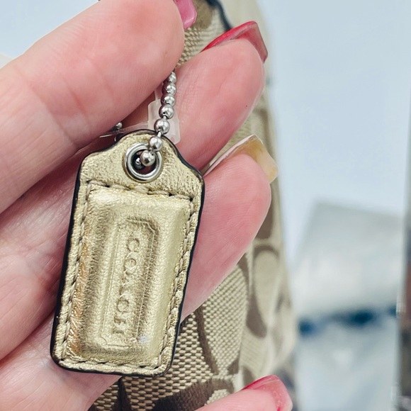 COACH SIGNATURE COLLECTION JACQUARD WRISTLET WITH LOGO CHARM  IN KHALI & BRONZE - Picture 9 of 15